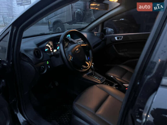 Черный Форд Фиеста, объемом двигателя 1.6 л и пробегом 204 тыс. км за 7350 $, фото 16 на Automoto.ua