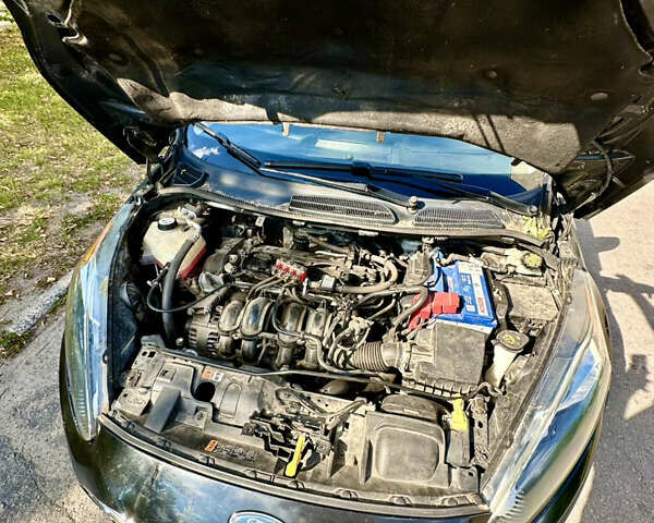 Черный Форд Фиеста, объемом двигателя 1.6 л и пробегом 129 тыс. км за 6100 $, фото 9 на Automoto.ua