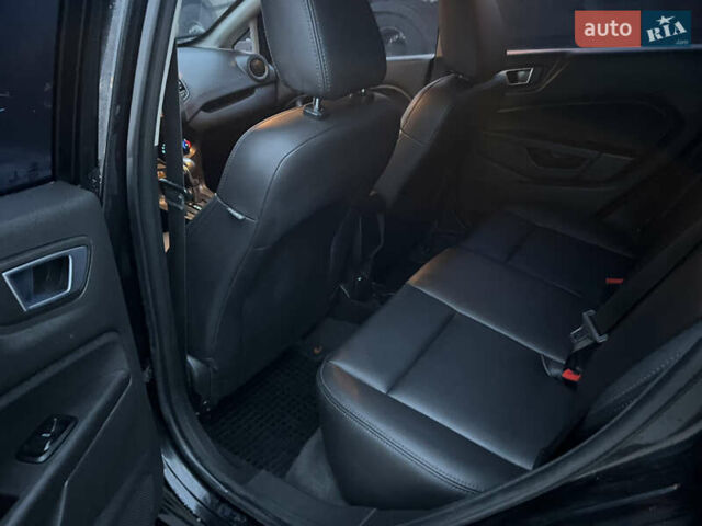 Черный Форд Фиеста, объемом двигателя 1.6 л и пробегом 204 тыс. км за 7350 $, фото 18 на Automoto.ua