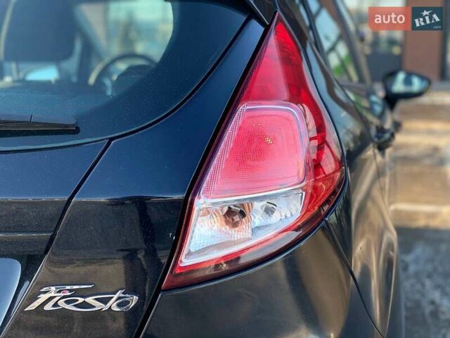 Чорний Форд Фієста, об'ємом двигуна 1 л та пробігом 196 тис. км за 4990 $, фото 10 на Automoto.ua