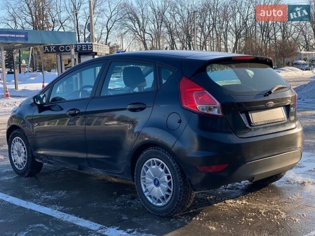 Чорний Форд Фієста, об'ємом двигуна 1 л та пробігом 196 тис. км за 4990 $, фото 6 на Automoto.ua