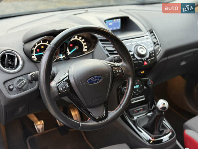 Черный Форд Фиеста, объемом двигателя 1 л и пробегом 173 тыс. км за 7600 $, фото 16 на Automoto.ua