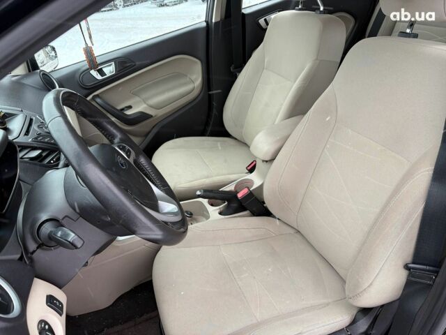 Черный Форд Фиеста, объемом двигателя 1.6 л и пробегом 157 тыс. км за 7490 $, фото 17 на Automoto.ua