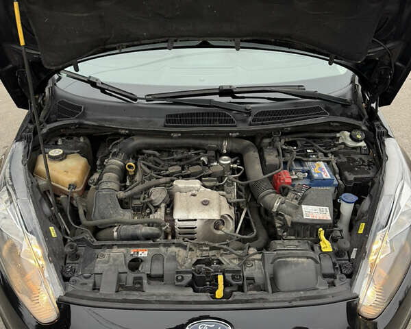 Чорний Форд Фієста, об'ємом двигуна 1 л та пробігом 131 тис. км за 8200 $, фото 9 на Automoto.ua