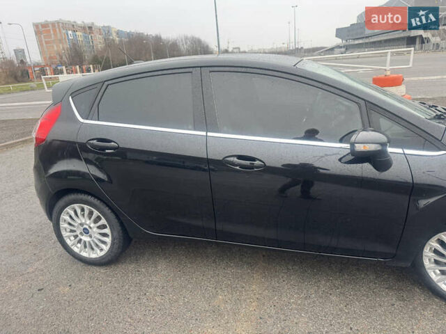 Чорний Форд Фієста, об'ємом двигуна 1.6 л та пробігом 218 тис. км за 8500 $, фото 15 на Automoto.ua