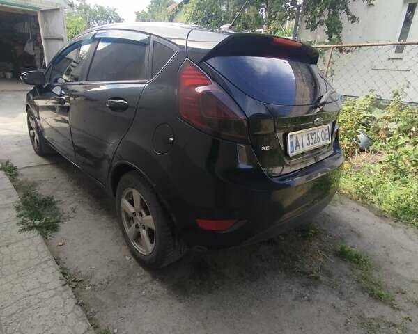 Чорний Форд Фієста, об'ємом двигуна 1.6 л та пробігом 138 тис. км за 8600 $, фото 1 на Automoto.ua