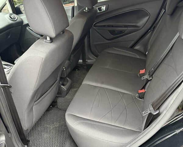 Чорний Форд Фієста, об'ємом двигуна 1 л та пробігом 131 тис. км за 8200 $, фото 7 на Automoto.ua