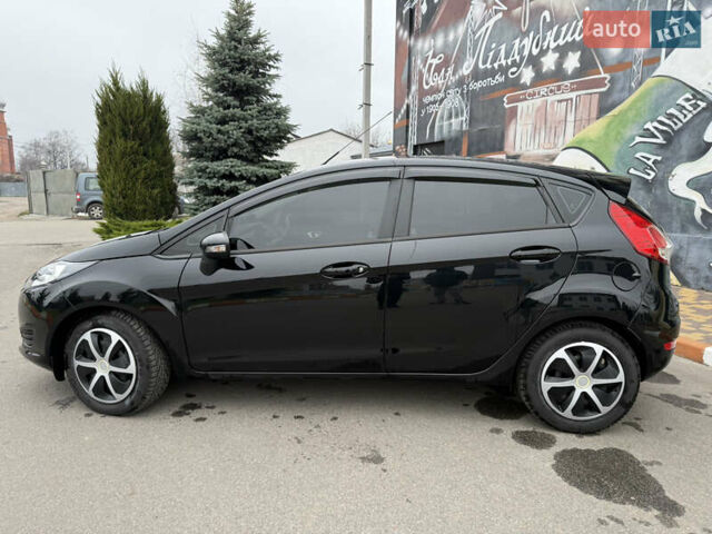 Чорний Форд Фієста, об'ємом двигуна 1 л та пробігом 131 тис. км за 8200 $, фото 3 на Automoto.ua