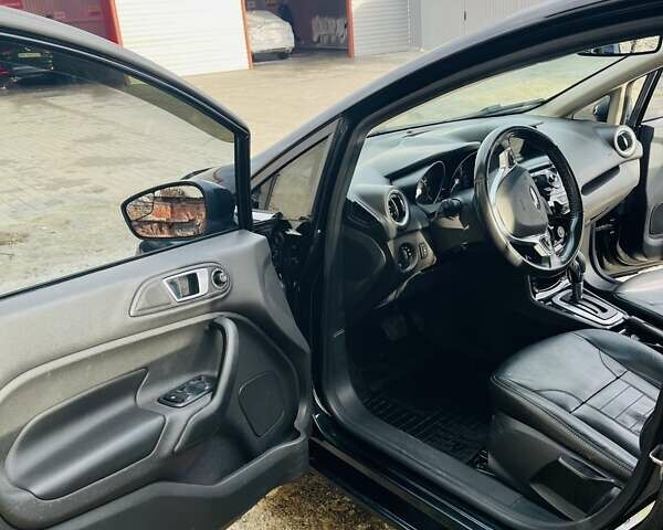 Черный Форд Фиеста, объемом двигателя 1.6 л и пробегом 122 тыс. км за 9500 $, фото 17 на Automoto.ua