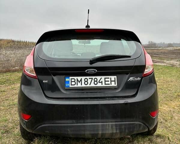 Черный Форд Фиеста, объемом двигателя 1.6 л и пробегом 117 тыс. км за 6800 $, фото 1 на Automoto.ua