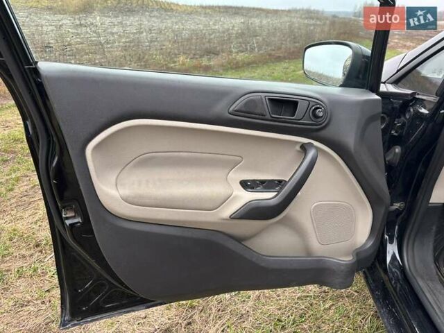 Черный Форд Фиеста, объемом двигателя 1.6 л и пробегом 117 тыс. км за 6800 $, фото 3 на Automoto.ua