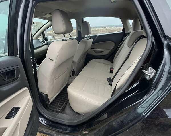 Черный Форд Фиеста, объемом двигателя 1.6 л и пробегом 117 тыс. км за 6800 $, фото 2 на Automoto.ua