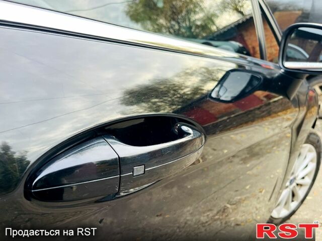 Черный Форд Фиеста, объемом двигателя 1.6 л и пробегом 122 тыс. км за 8300 $, фото 6 на Automoto.ua