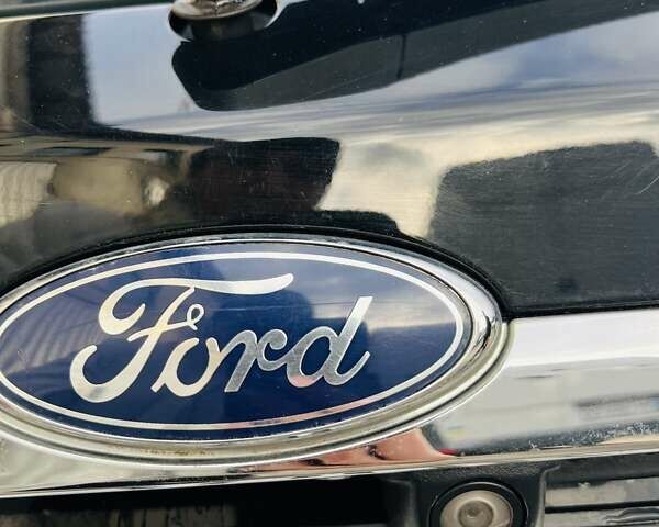 Черный Форд Фиеста, объемом двигателя 1.6 л и пробегом 122 тыс. км за 9500 $, фото 11 на Automoto.ua