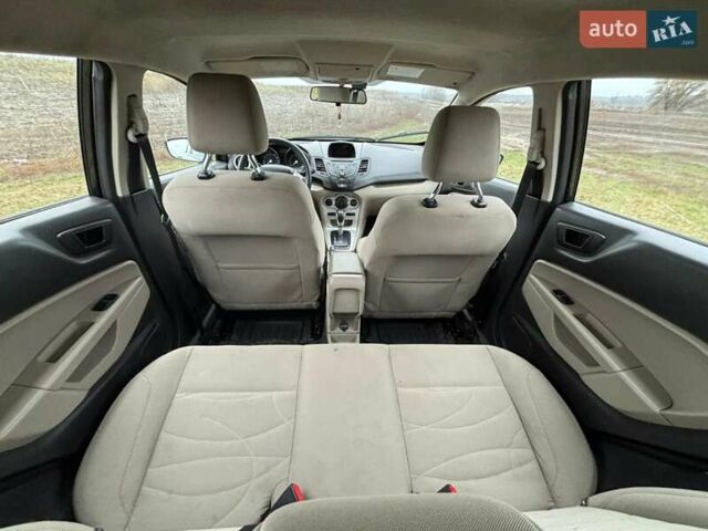 Черный Форд Фиеста, объемом двигателя 1.6 л и пробегом 117 тыс. км за 6800 $, фото 6 на Automoto.ua