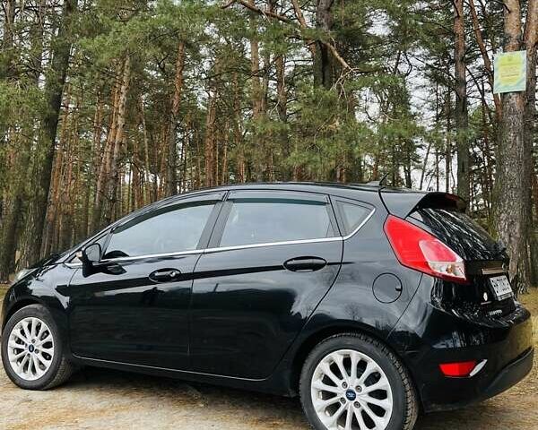 Черный Форд Фиеста, объемом двигателя 1.6 л и пробегом 122 тыс. км за 9500 $, фото 4 на Automoto.ua