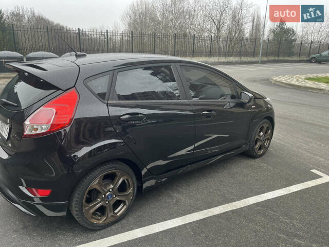 Черный Форд Фиеста, объемом двигателя 1.6 л и пробегом 95 тыс. км за 9600 $, фото 4 на Automoto.ua