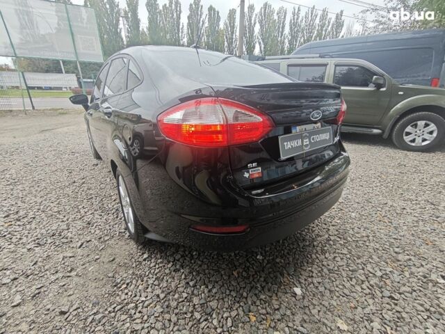 Черный Форд Фиеста, объемом двигателя 1.6 л и пробегом 84 тыс. км за 9500 $, фото 7 на Automoto.ua