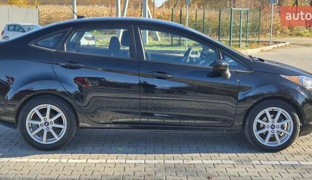Черный Форд Фиеста, объемом двигателя 1.6 л и пробегом 175 тыс. км за 8950 $, фото 8 на Automoto.ua