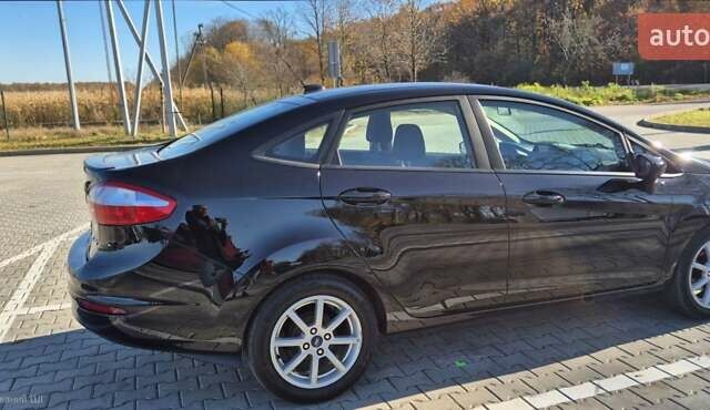 Черный Форд Фиеста, объемом двигателя 1.6 л и пробегом 175 тыс. км за 8950 $, фото 6 на Automoto.ua