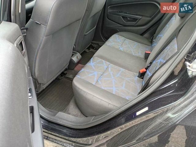 Чорний Форд Фієста, об'ємом двигуна 1.6 л та пробігом 240 тис. км за 5990 $, фото 4 на Automoto.ua