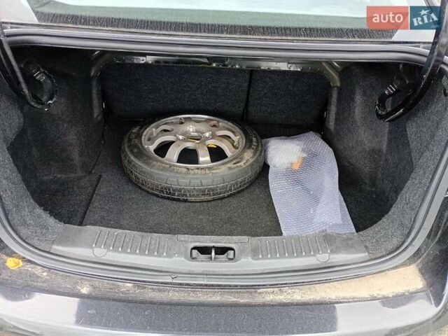 Чорний Форд Фієста, об'ємом двигуна 1.6 л та пробігом 240 тис. км за 5990 $, фото 3 на Automoto.ua