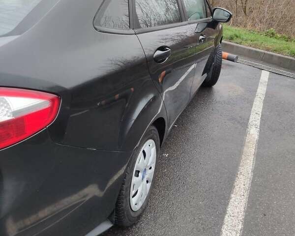 Черный Форд Фиеста, объемом двигателя 1.6 л и пробегом 98 тыс. км за 7200 $, фото 8 на Automoto.ua