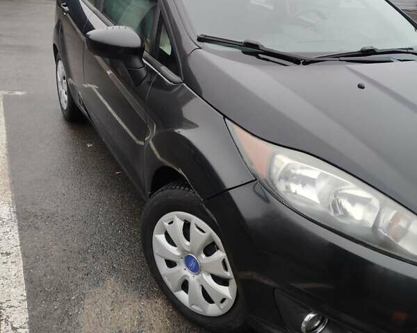 Черный Форд Фиеста, объемом двигателя 1.6 л и пробегом 98 тыс. км за 7200 $, фото 5 на Automoto.ua