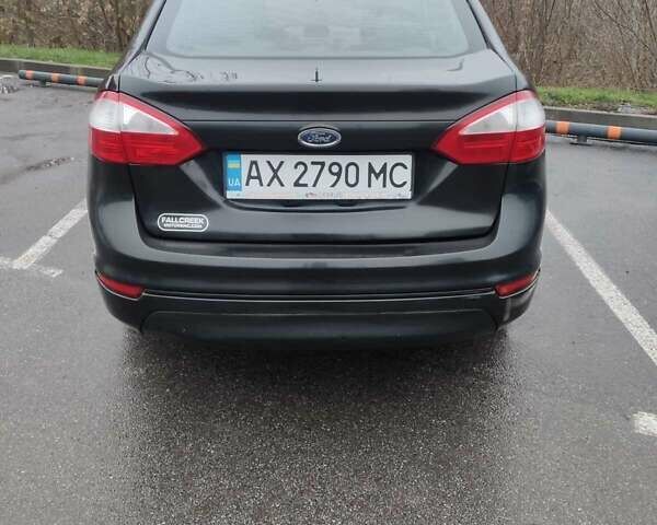 Черный Форд Фиеста, объемом двигателя 1.6 л и пробегом 98 тыс. км за 7200 $, фото 4 на Automoto.ua