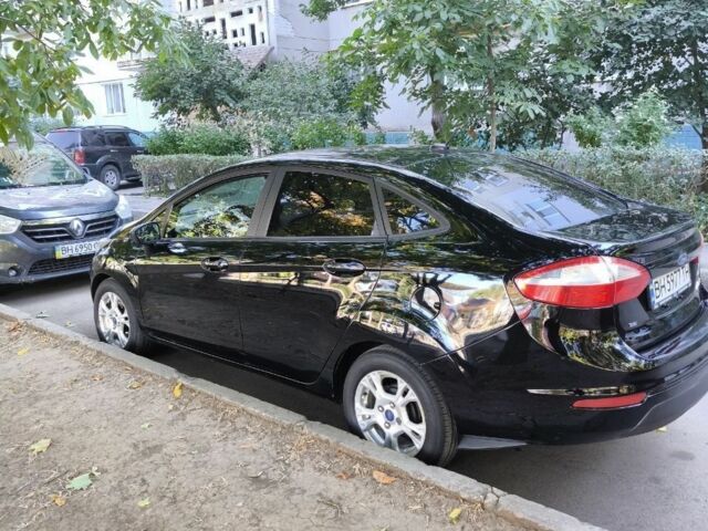 Черный Форд Фиеста, объемом двигателя 1.6 л и пробегом 150 тыс. км за 7000 $, фото 1 на Automoto.ua
