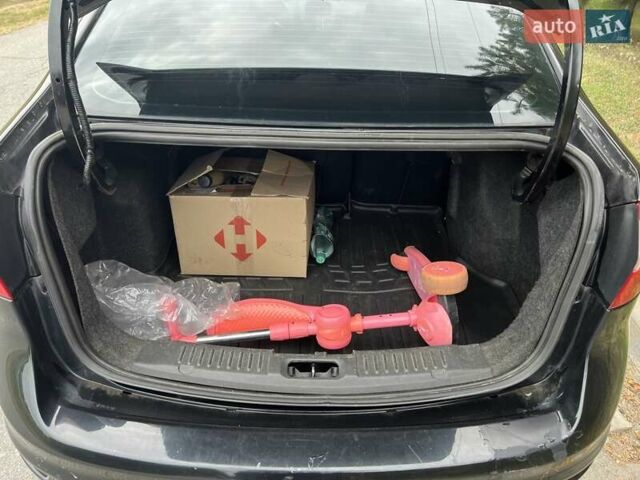 Чорний Форд Фієста, об'ємом двигуна 1.6 л та пробігом 184 тис. км за 7200 $, фото 10 на Automoto.ua