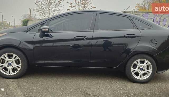 Черный Форд Фиеста, объемом двигателя 1.6 л и пробегом 168 тыс. км за 5900 $, фото 3 на Automoto.ua