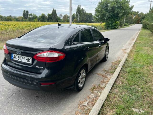 Черный Форд Фиеста, объемом двигателя 1.6 л и пробегом 184 тыс. км за 7200 $, фото 5 на Automoto.ua