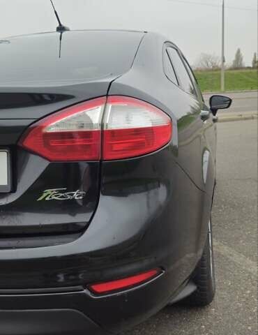 Черный Форд Фиеста, объемом двигателя 1.6 л и пробегом 168 тыс. км за 5900 $, фото 7 на Automoto.ua