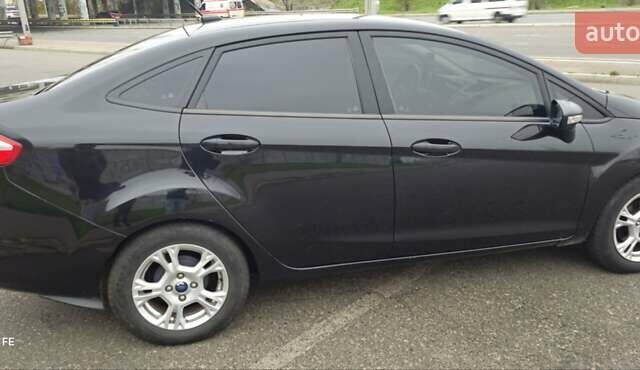Черный Форд Фиеста, объемом двигателя 1.6 л и пробегом 168 тыс. км за 5900 $, фото 9 на Automoto.ua