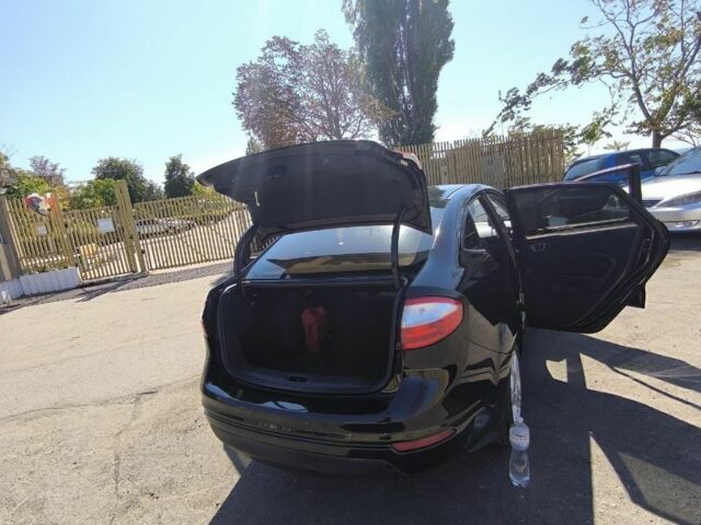 Черный Форд Фиеста, объемом двигателя 1.6 л и пробегом 150 тыс. км за 7000 $, фото 3 на Automoto.ua