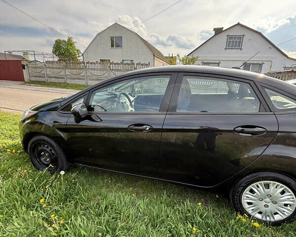Черный Форд Фиеста, объемом двигателя 1.6 л и пробегом 71 тыс. км за 7500 $, фото 19 на Automoto.ua