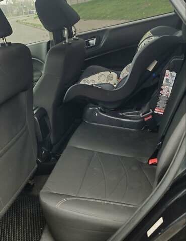 Черный Форд Фиеста, объемом двигателя 1.6 л и пробегом 168 тыс. км за 5900 $, фото 19 на Automoto.ua