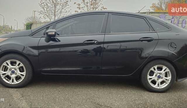 Черный Форд Фиеста, объемом двигателя 1.6 л и пробегом 168 тыс. км за 5900 $, фото 4 на Automoto.ua