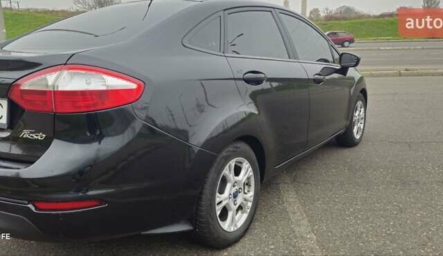 Черный Форд Фиеста, объемом двигателя 1.6 л и пробегом 168 тыс. км за 5900 $, фото 10 на Automoto.ua