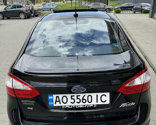 Черный Форд Фиеста, объемом двигателя 1.6 л и пробегом 180 тыс. км за 8300 $, фото 11 на Automoto.ua