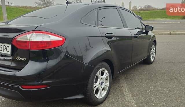 Черный Форд Фиеста, объемом двигателя 1.6 л и пробегом 168 тыс. км за 5900 $, фото 11 на Automoto.ua