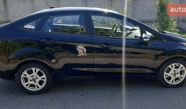Чорний Форд Фієста, об'ємом двигуна 1.6 л та пробігом 97 тис. км за 8400 $, фото 4 на Automoto.ua