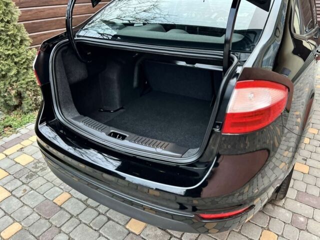 Черный Форд Фиеста, объемом двигателя 1.6 л и пробегом 123 тыс. км за 6300 $, фото 5 на Automoto.ua