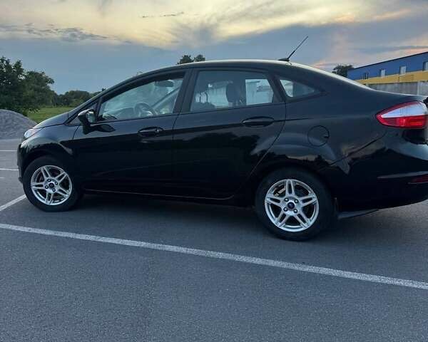 Черный Форд Фиеста, объемом двигателя 1.6 л и пробегом 130 тыс. км за 8400 $, фото 5 на Automoto.ua
