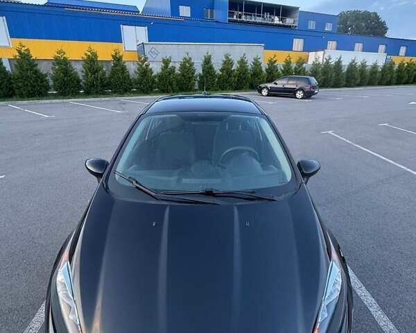 Черный Форд Фиеста, объемом двигателя 1.6 л и пробегом 130 тыс. км за 8400 $, фото 14 на Automoto.ua