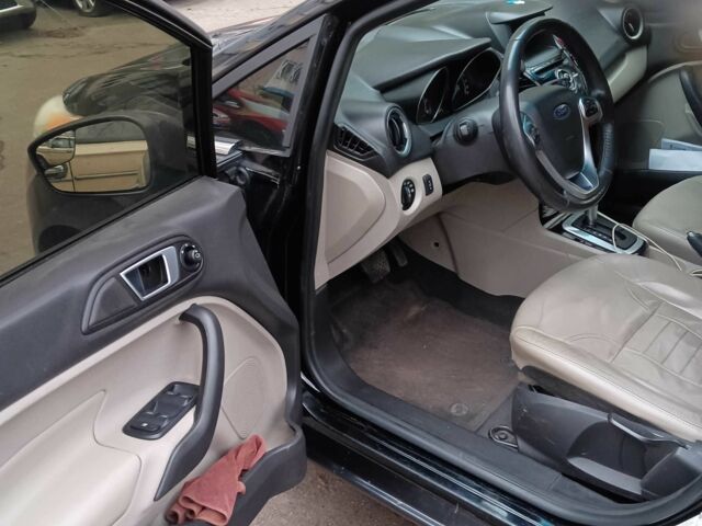 Черный Форд Фиеста, объемом двигателя 1.6 л и пробегом 178 тыс. км за 8500 $, фото 1 на Automoto.ua