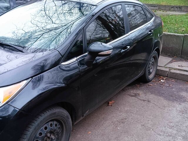 Черный Форд Фиеста, объемом двигателя 1.6 л и пробегом 178 тыс. км за 8500 $, фото 10 на Automoto.ua