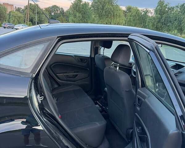 Черный Форд Фиеста, объемом двигателя 1.6 л и пробегом 130 тыс. км за 8400 $, фото 18 на Automoto.ua