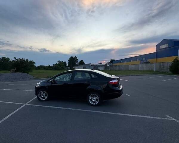 Черный Форд Фиеста, объемом двигателя 1.6 л и пробегом 130 тыс. км за 8400 $, фото 9 на Automoto.ua